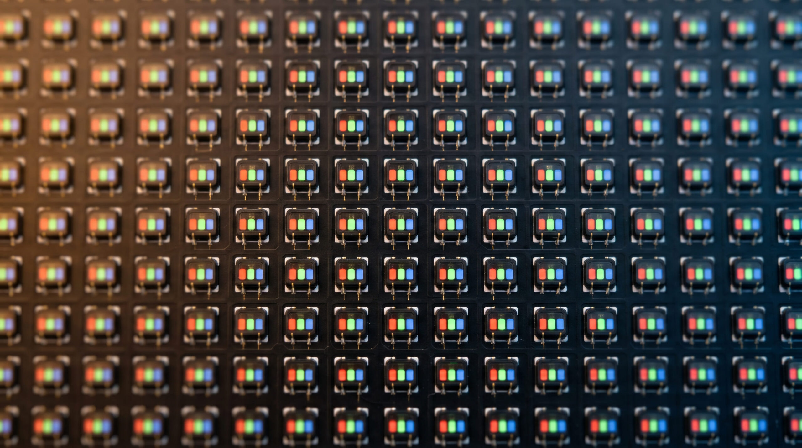 Macro close-up of fine-pitch indoor LED display showing pixel pitch and SMD module structure